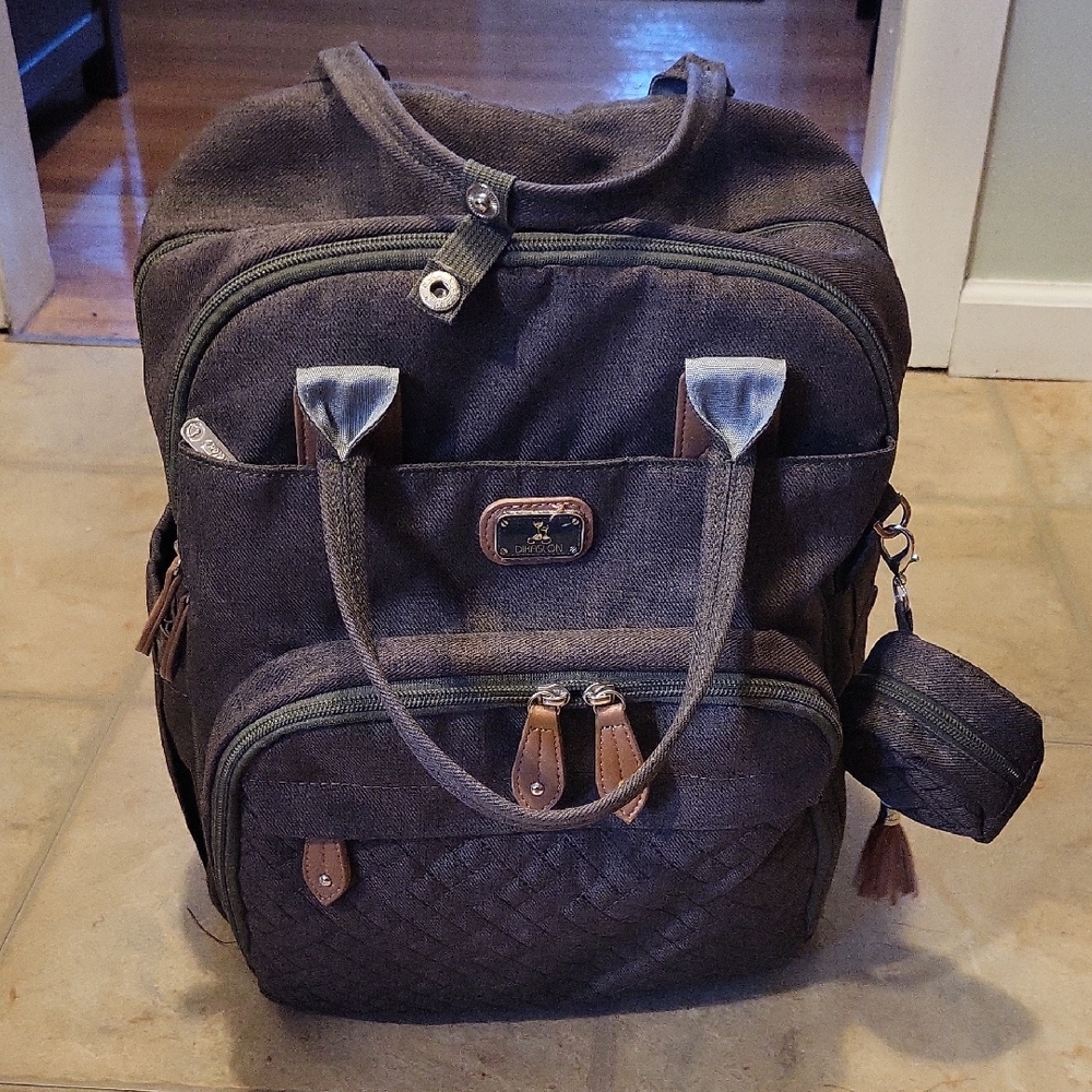 Dikaslon Elegant Brown Baby Bag. Great Way For Daddy To Help Mommy.